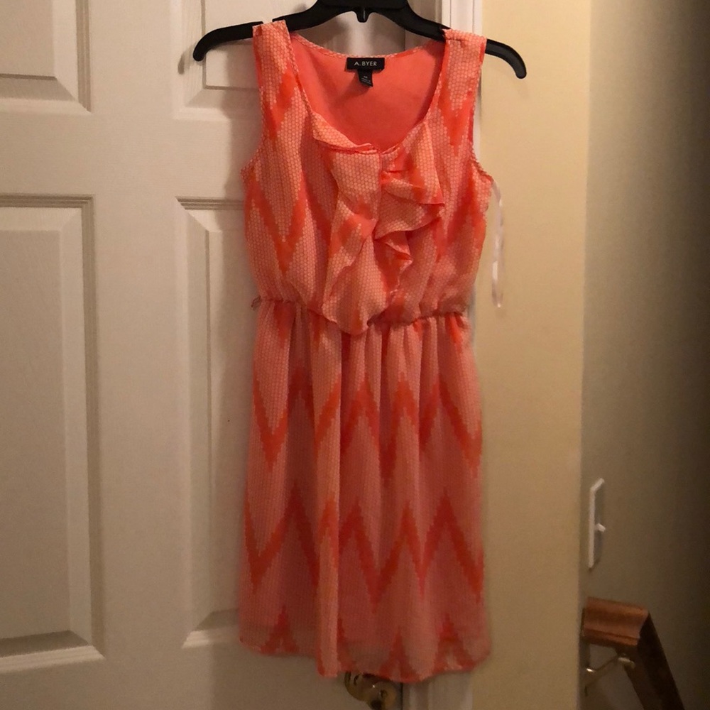 I am selling this cute orange dress..